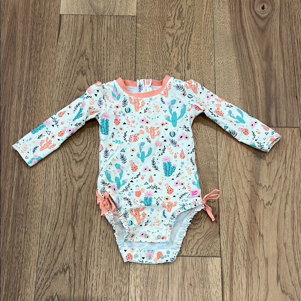 Ruffle Butts Peach and Green Baby Onesie
